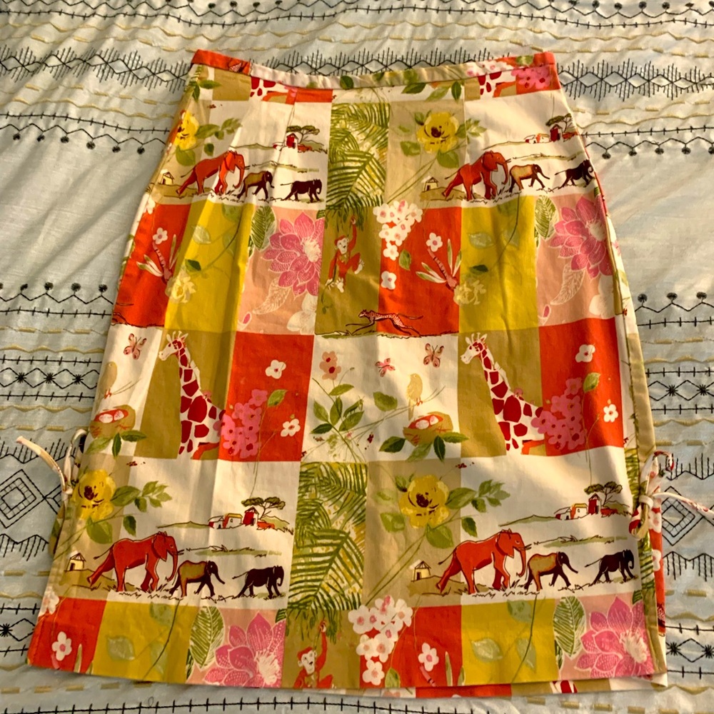 Cute straight animal print skirt.  Size 6, zips in back